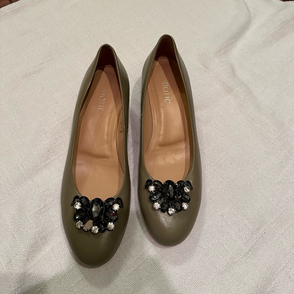 Hotic.  Rhinestone leather slip on 1.5 in heels.
